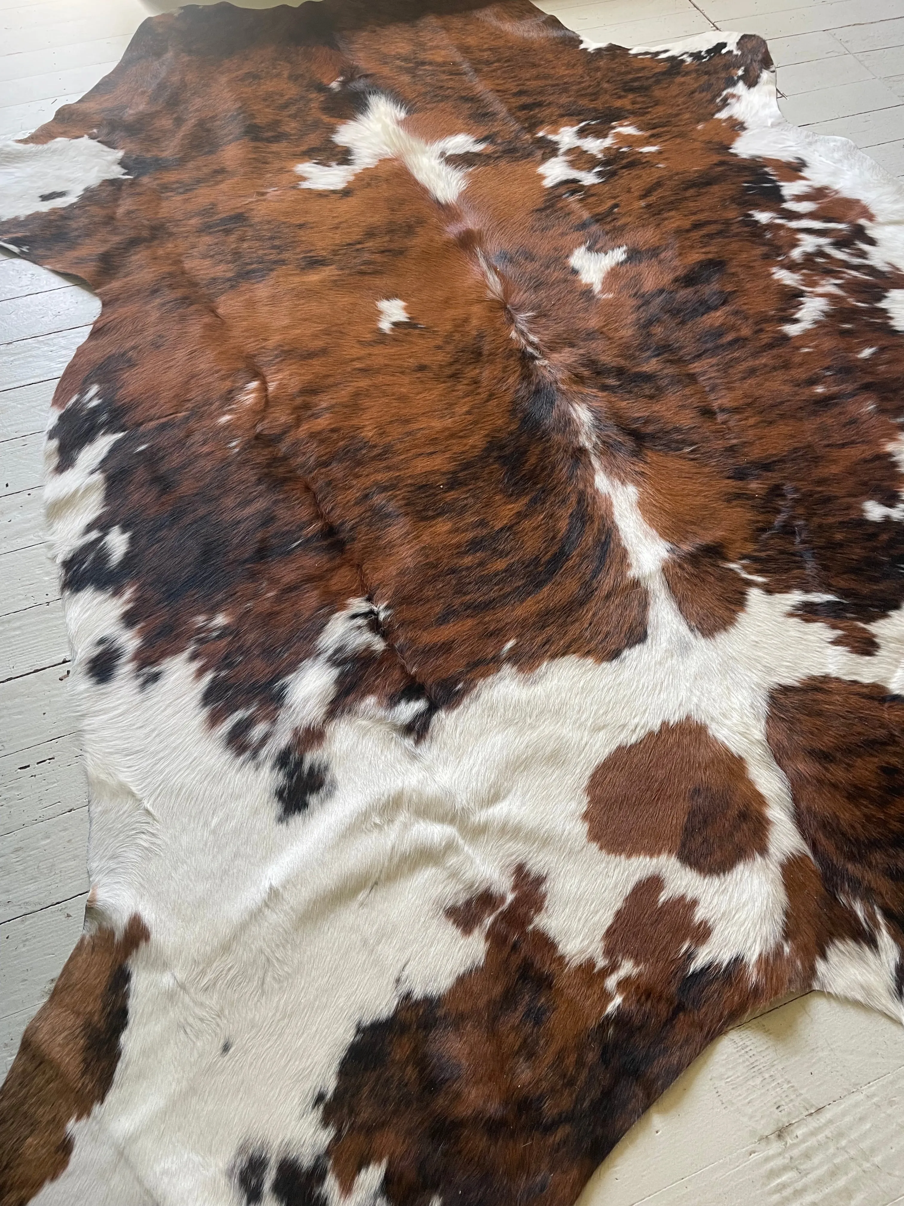 Genuine Brindle cowhide 4’8x6’8