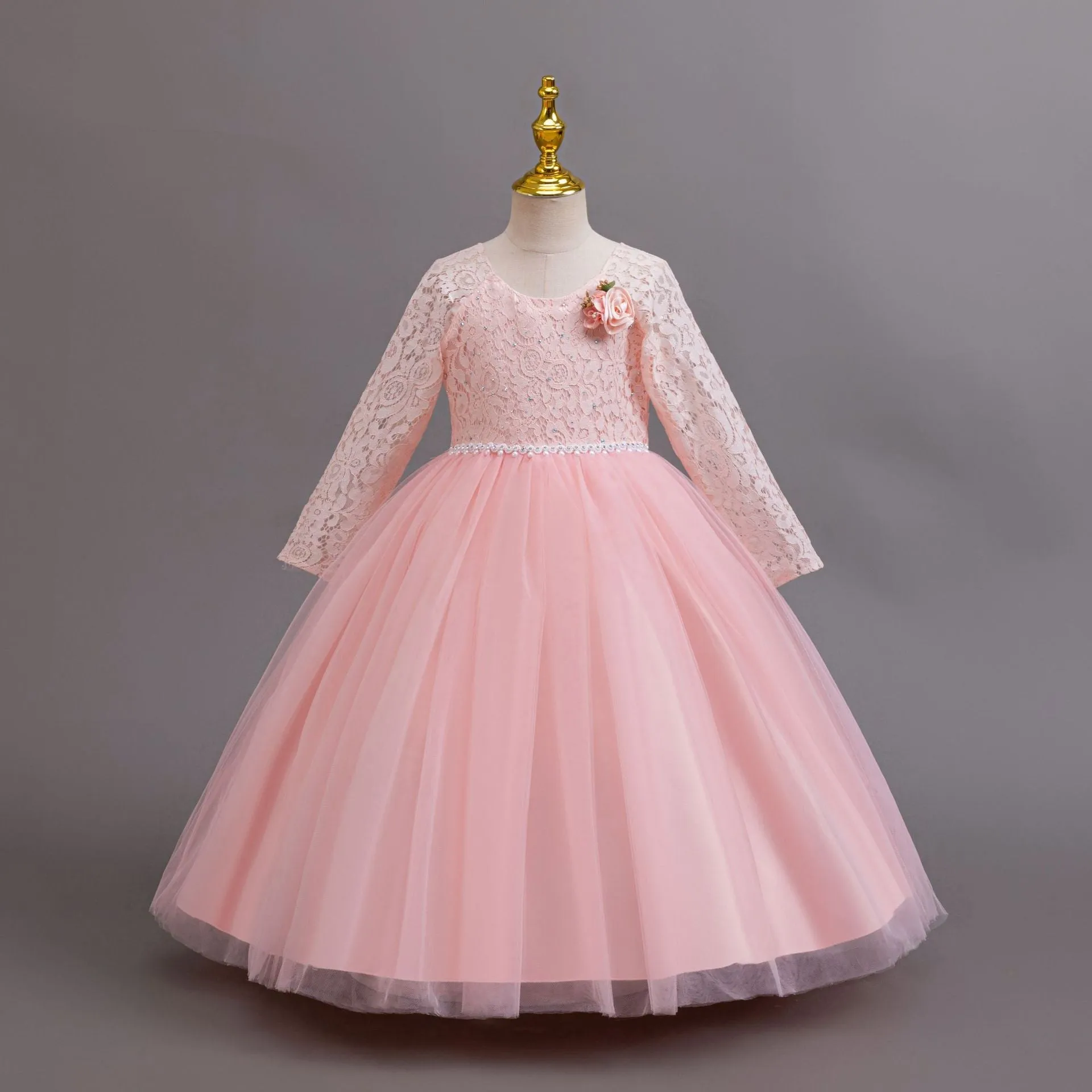 Long Sleeve Lace Flower Girl Gown with Full Tulle Skirt and Floral Accent