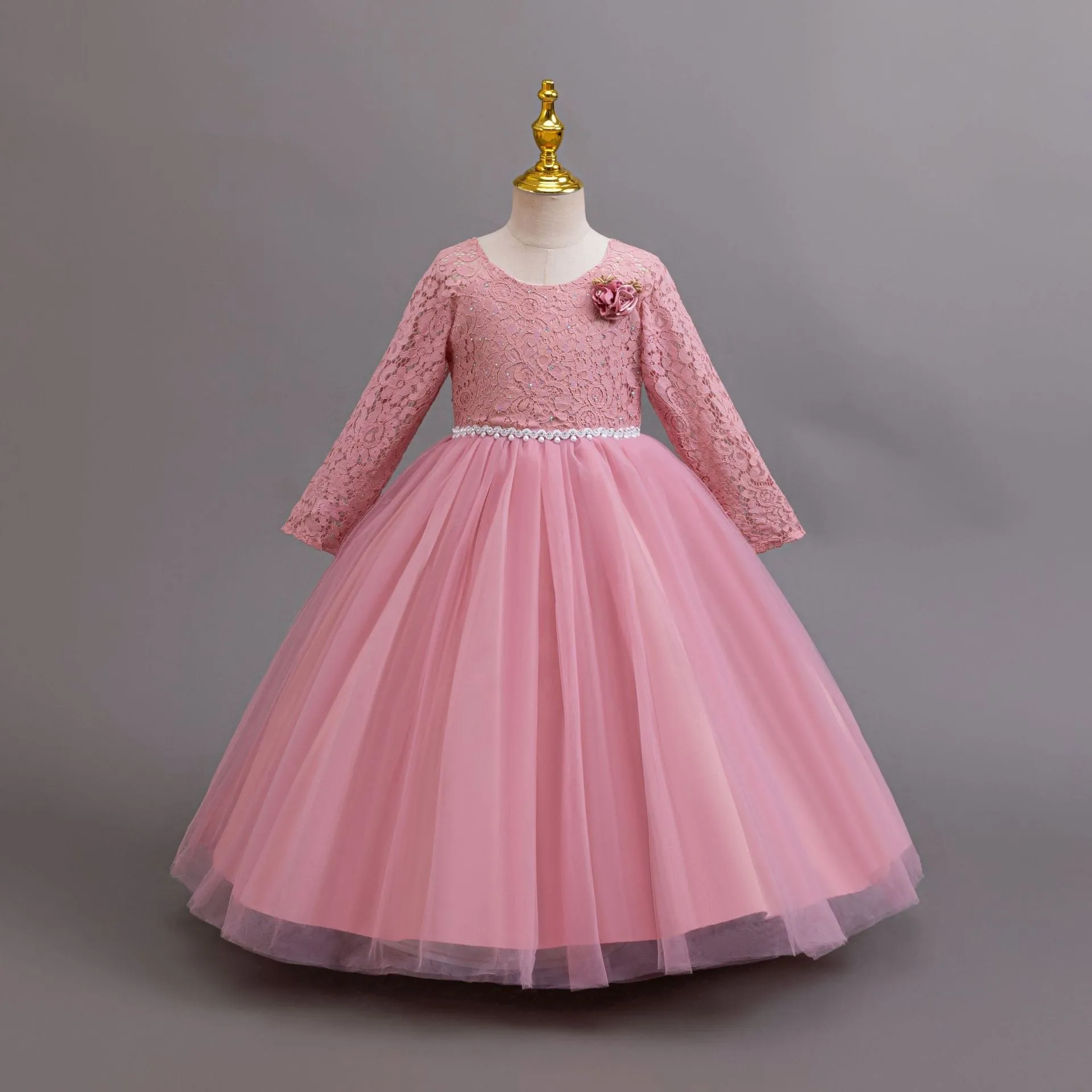 Long Sleeve Lace Flower Girl Gown with Full Tulle Skirt and Floral Accent