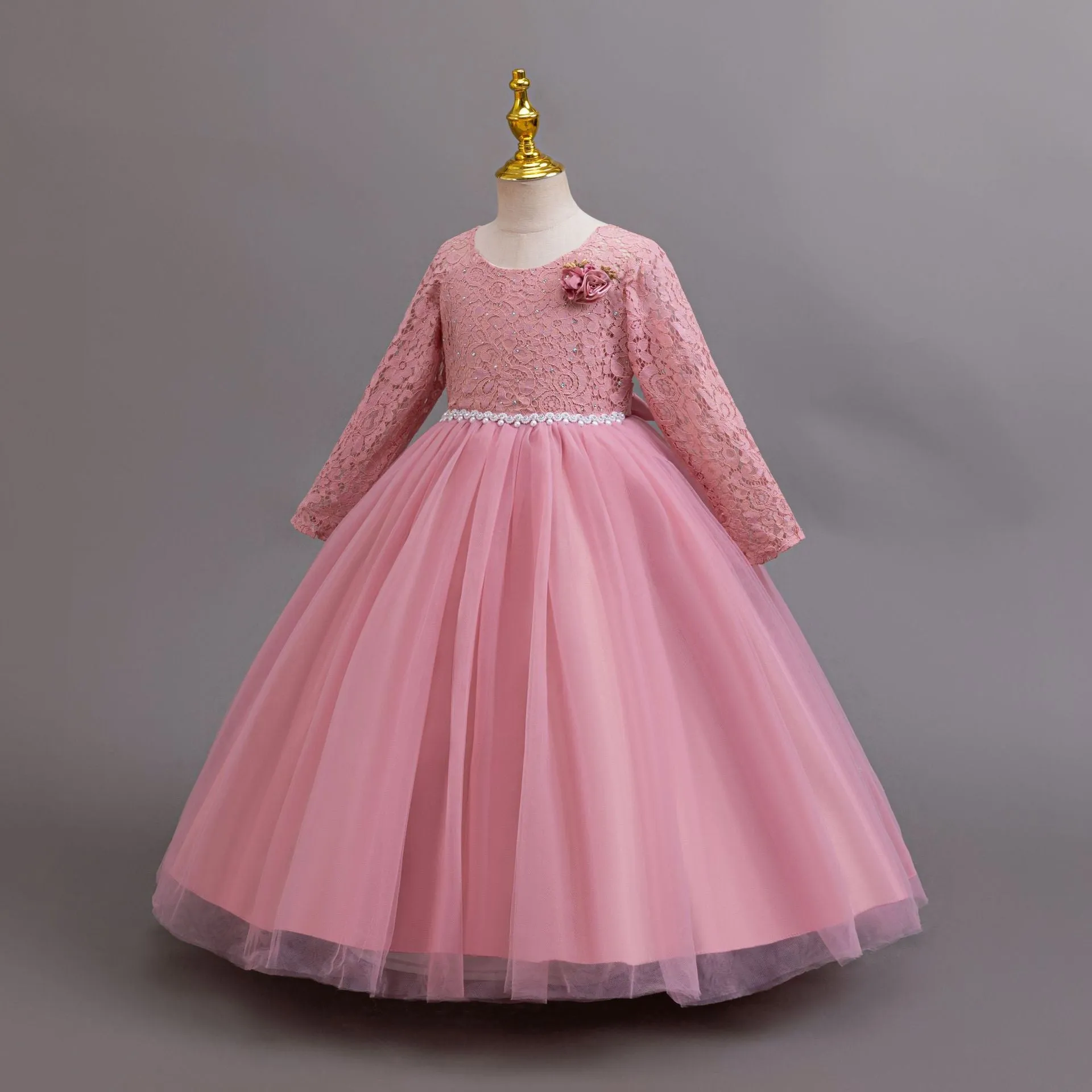 Long Sleeve Lace Flower Girl Gown with Full Tulle Skirt and Floral Accent