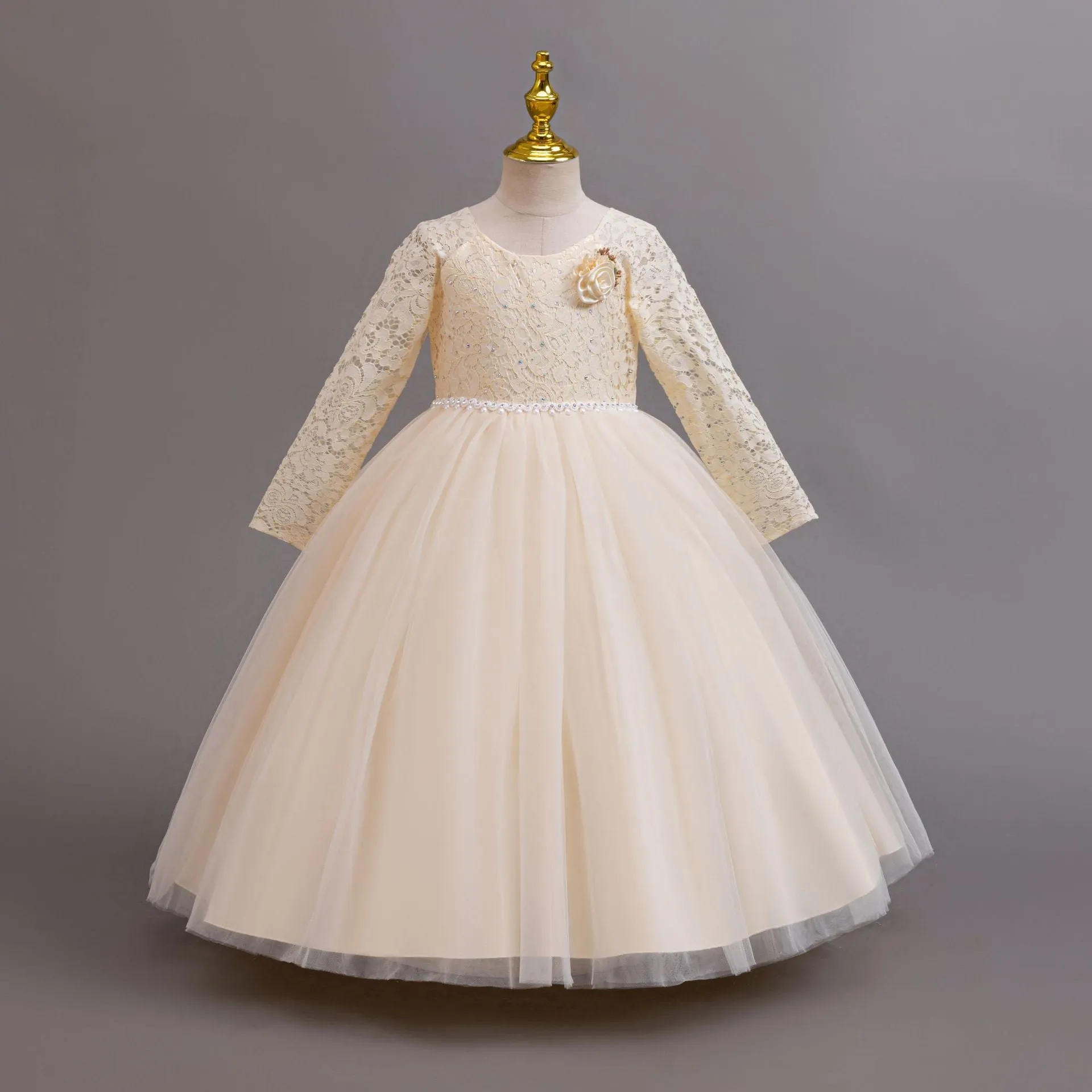 Long Sleeve Lace Flower Girl Gown with Full Tulle Skirt and Floral Accent