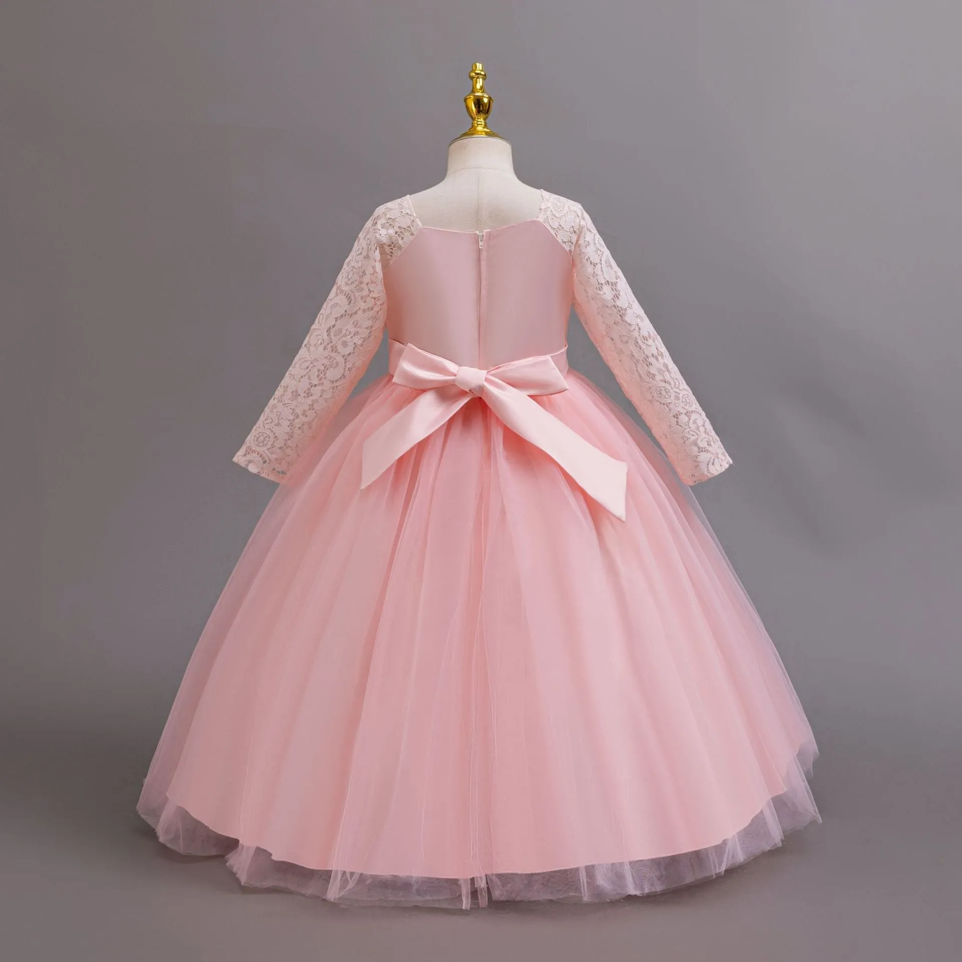 Long Sleeve Lace Flower Girl Gown with Full Tulle Skirt and Floral Accent
