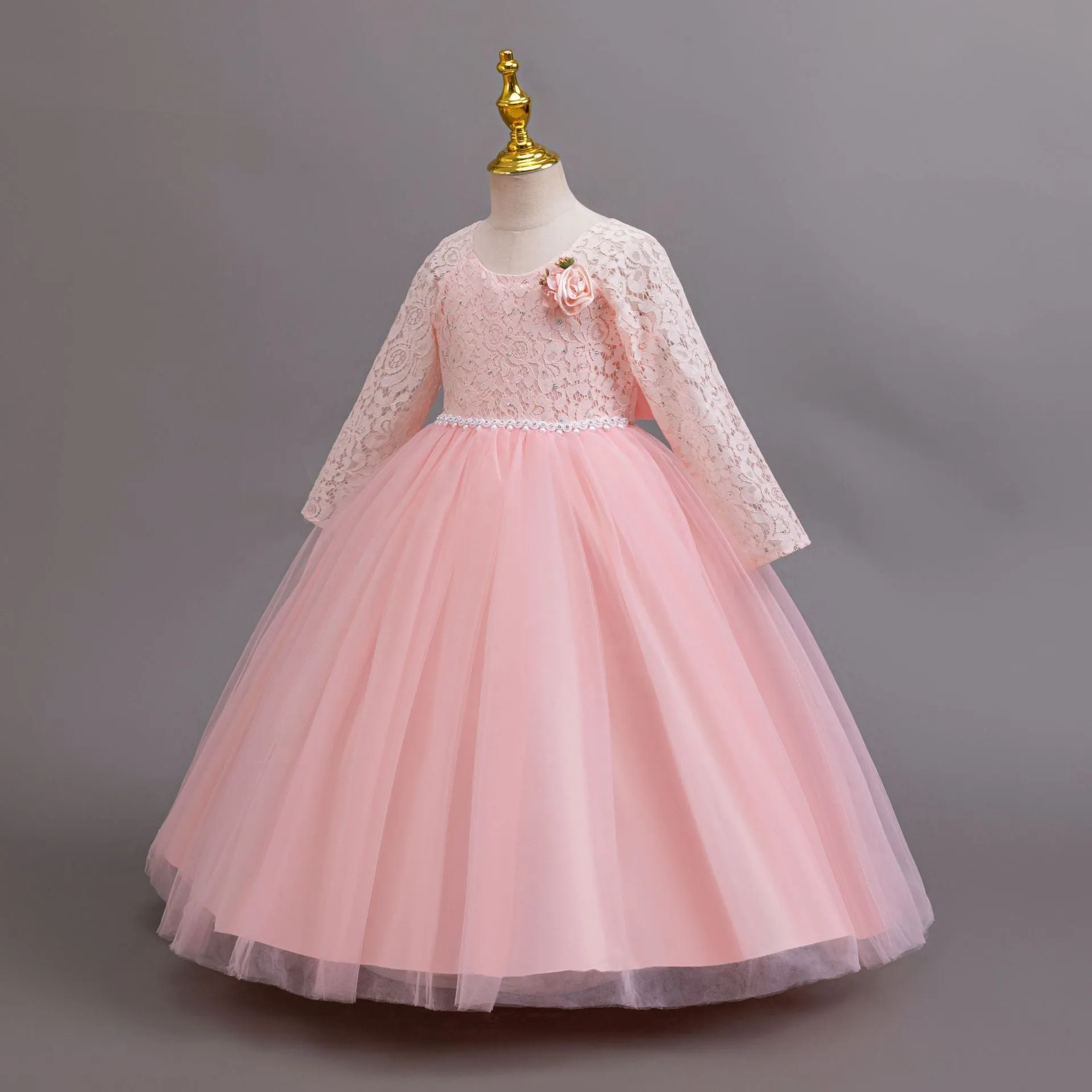 Long Sleeve Lace Flower Girl Gown with Full Tulle Skirt and Floral Accent