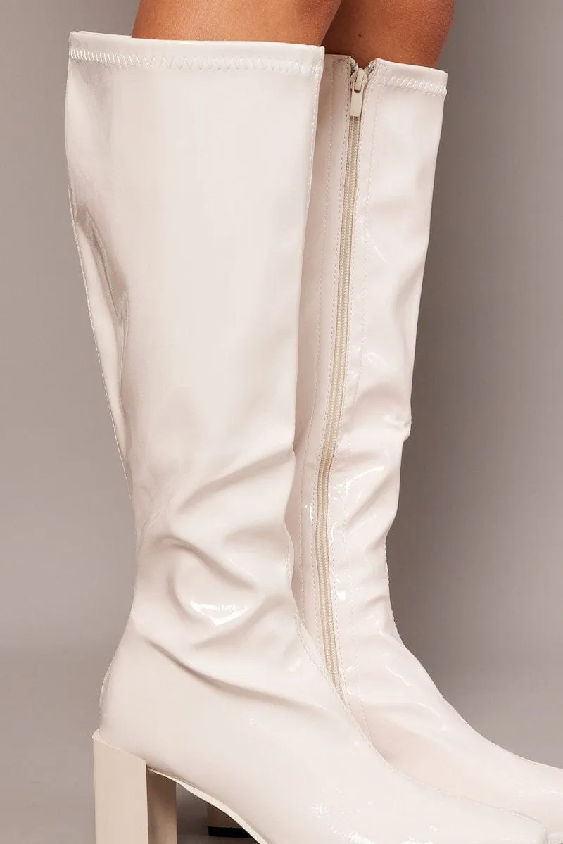 White Knee High Boots in Patent